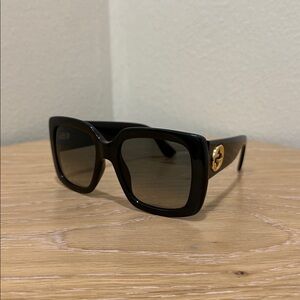 Authentic Gucci Women's Sunglasses in Black with Gold Detail